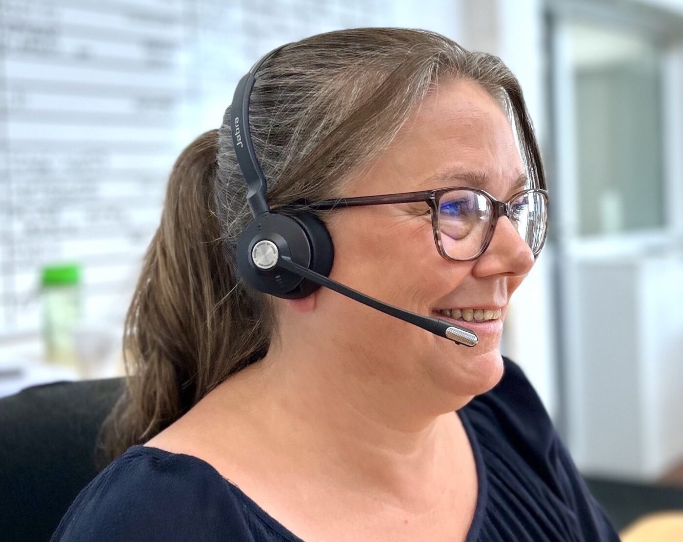 PJ Circular Engineering colleague with a headset, ready to help customers