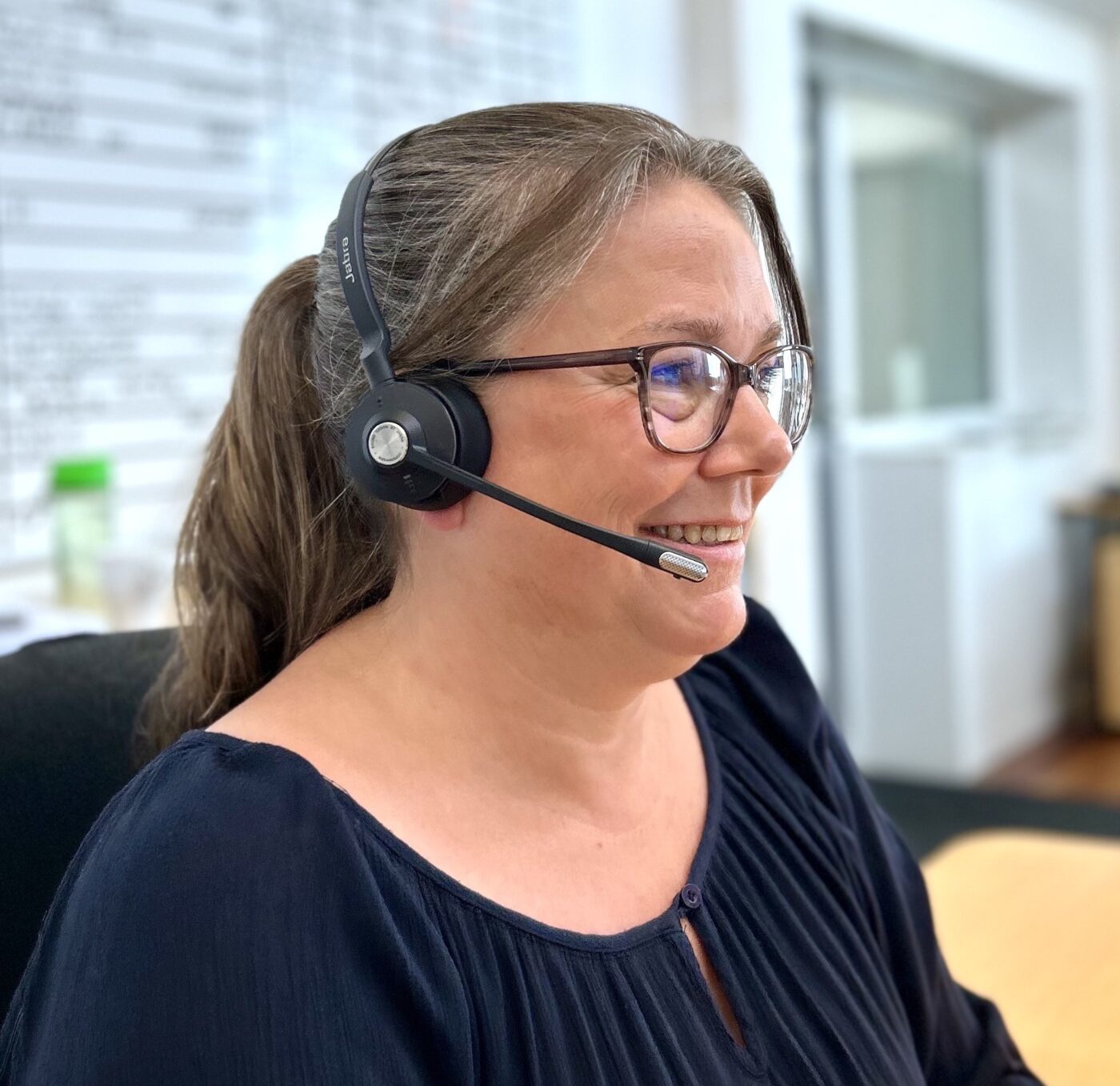 PJ Circular Engineering colleague with a headset, ready to help customers