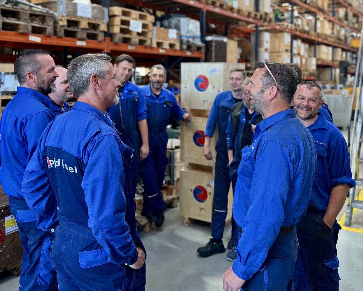 The PJ Circular Engineering team gathered in the warehouse
