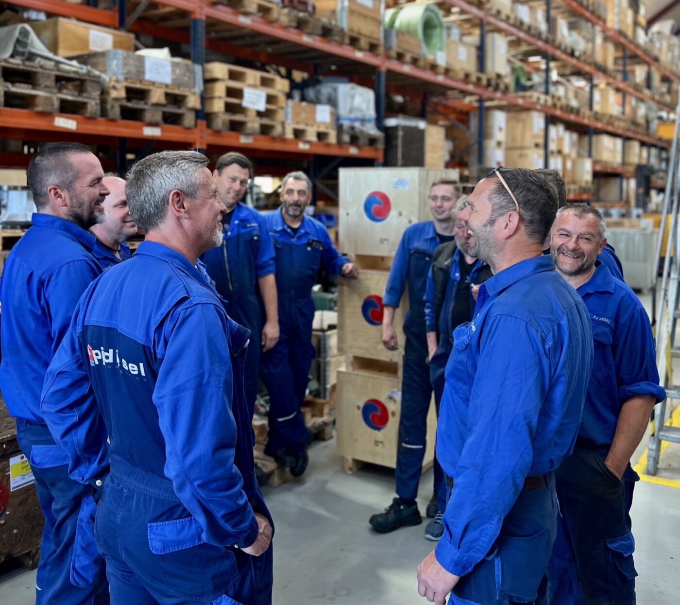 The PJ Circular Engineering team gathered in the warehouse