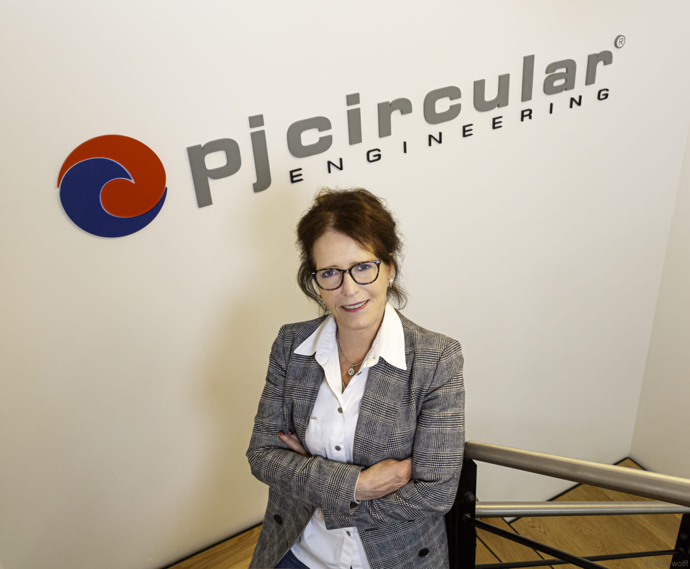 Portrait in front of the PJ Circular Engineering logo