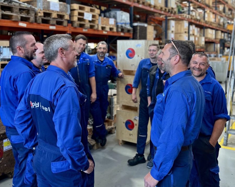 The PJ Circular Engineering team gathered in the warehouse